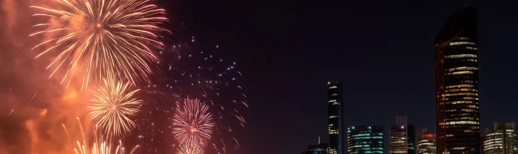 Riverfire fireworks over Brisbane River with city skyline in the background – Capturing the festival’s iconic opening night with bright explosions and reflections. Events & Group Travel with Coach Hire